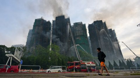 Hong Kong'daki Yangında Hayatını Kaybedenlerin Sayısı 65’e Yükseldi